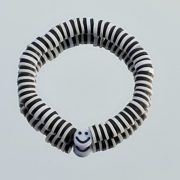 Clay beads stretchy string bracelet when you buy 2 you get 1 free bracelet! - Picture 1 of 2